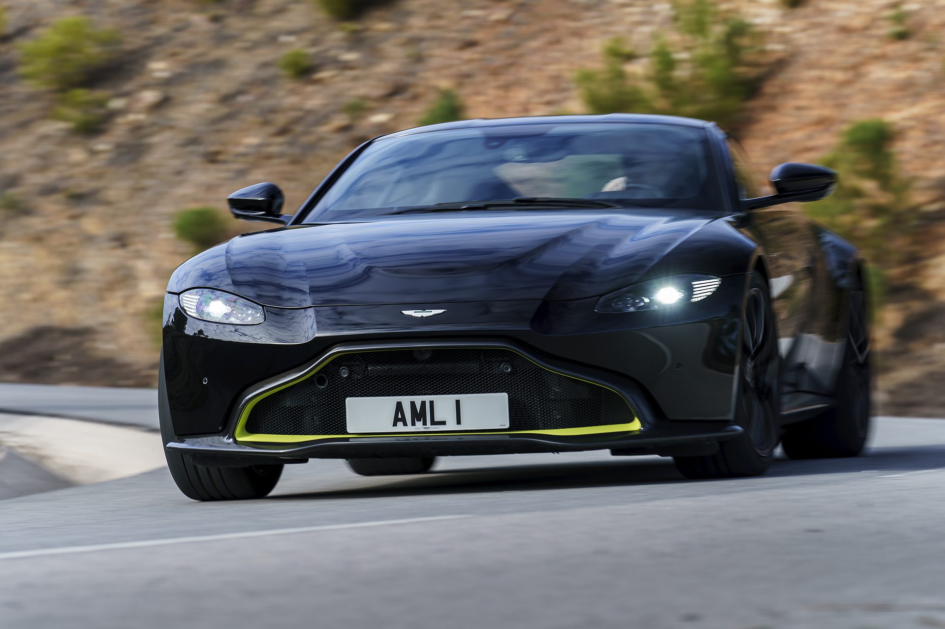 Aston Martin Vantage black and lime front three-quarter